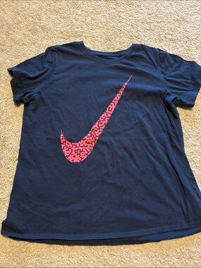 The Nike Tee Navy T-Shirt with Pink Swoosh